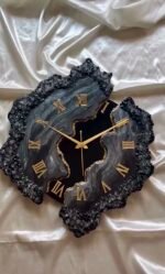 Front view of handmade black resin wall clock with glossy geode finish