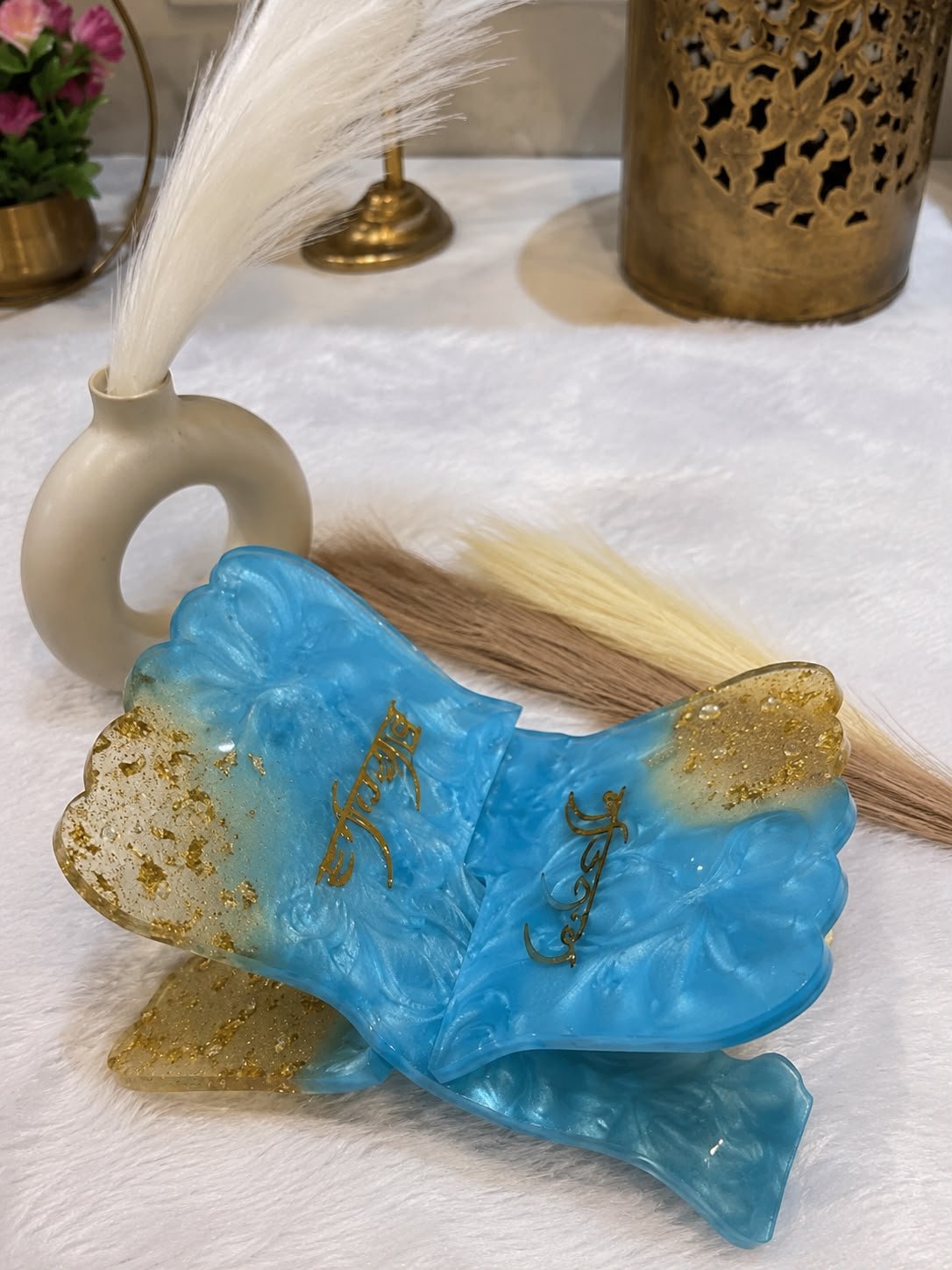 Handcrafted blue resin Sikh Khanda decor with gold flakes and religious detailing