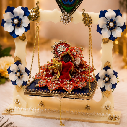 Handcrafted Laddu Gopal Ji jhula with blue and white flowers, peacock feather and decorative details