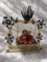 Front view of handmade Laddu Gopal Ji Jhula with decorated swing and Krishna Ji idol