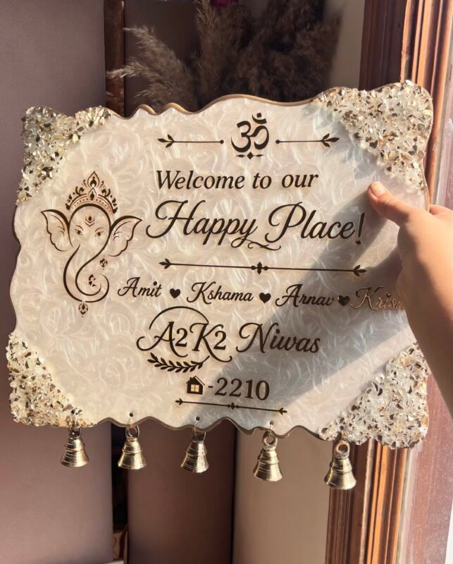 Personalized resin home nameplate with Ganesha design and golden bells