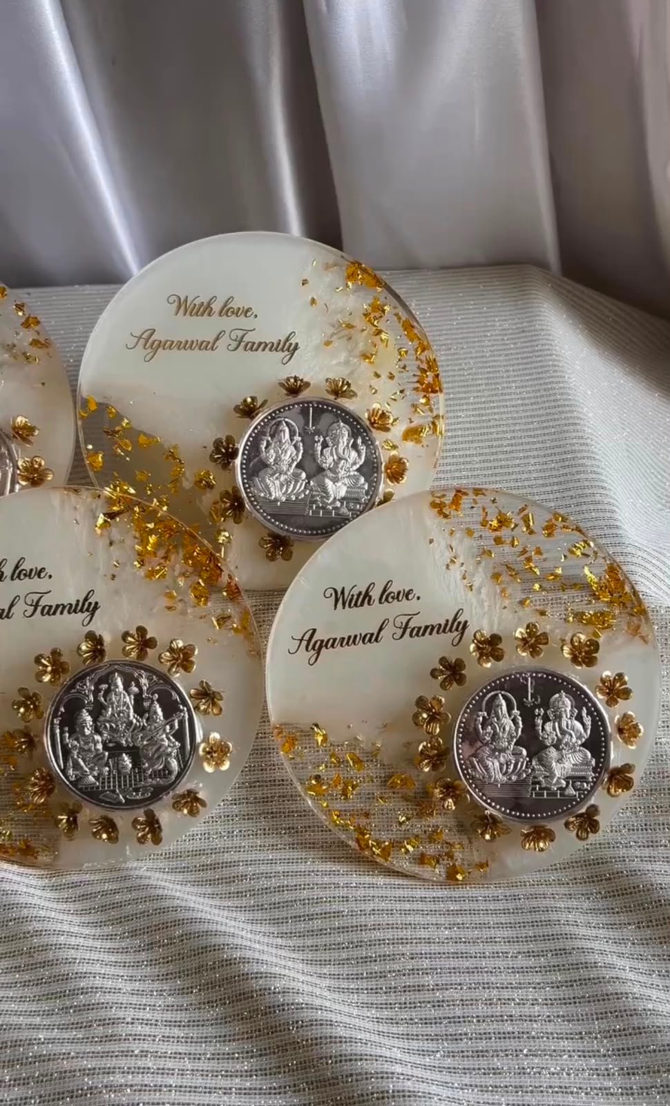 Round handmade resin coin platter with Lakshmi Ganesh coin and personalized message